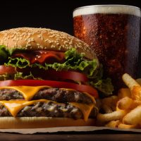 Grilled hamburger meal with fries and cheese ,generative artificial intelligence